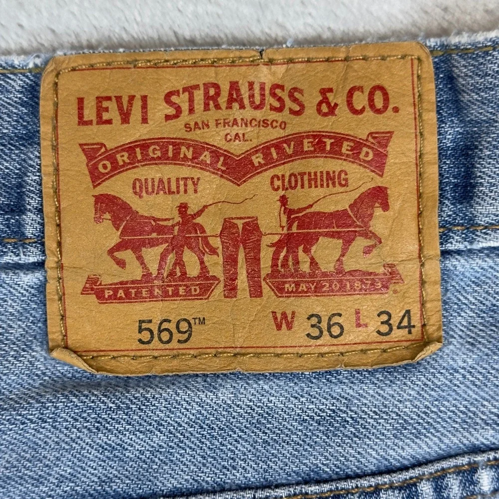 Levi's 569 Loose Straight Jeans 36x34 Light Wash Heavily Distressed‎ Faded